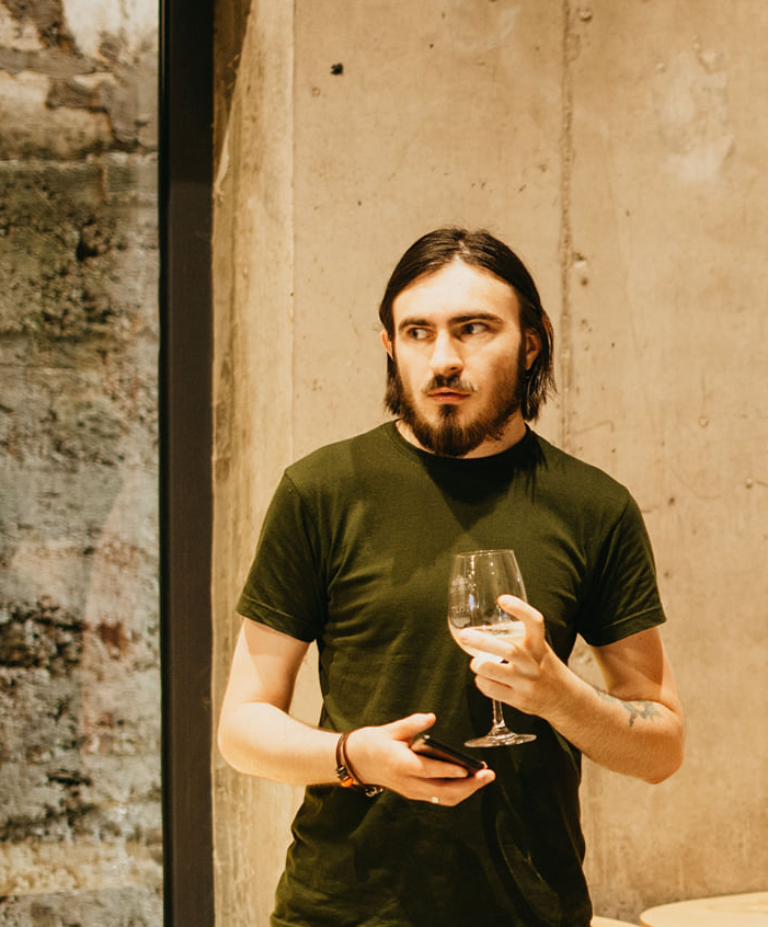 Dumitru Botezatu, the CEO of Inovector celebrating with a glass of champagne